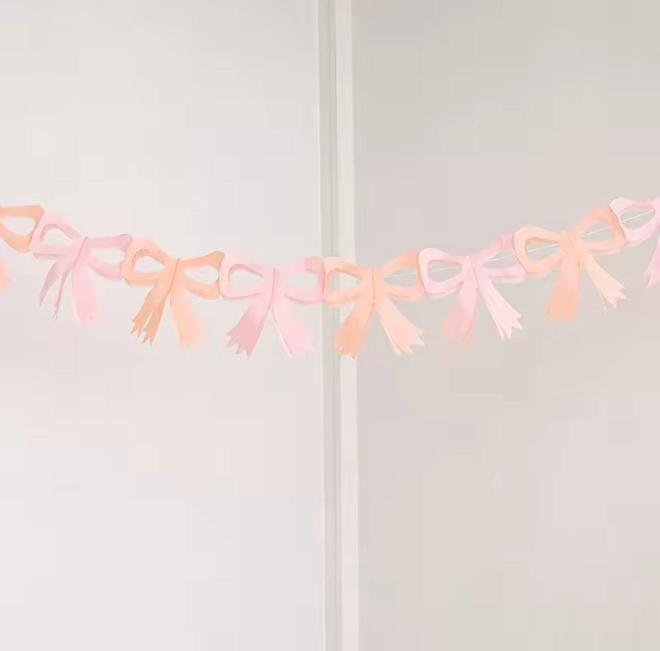 Tissue Paper Bow Garland in Pink and Peach