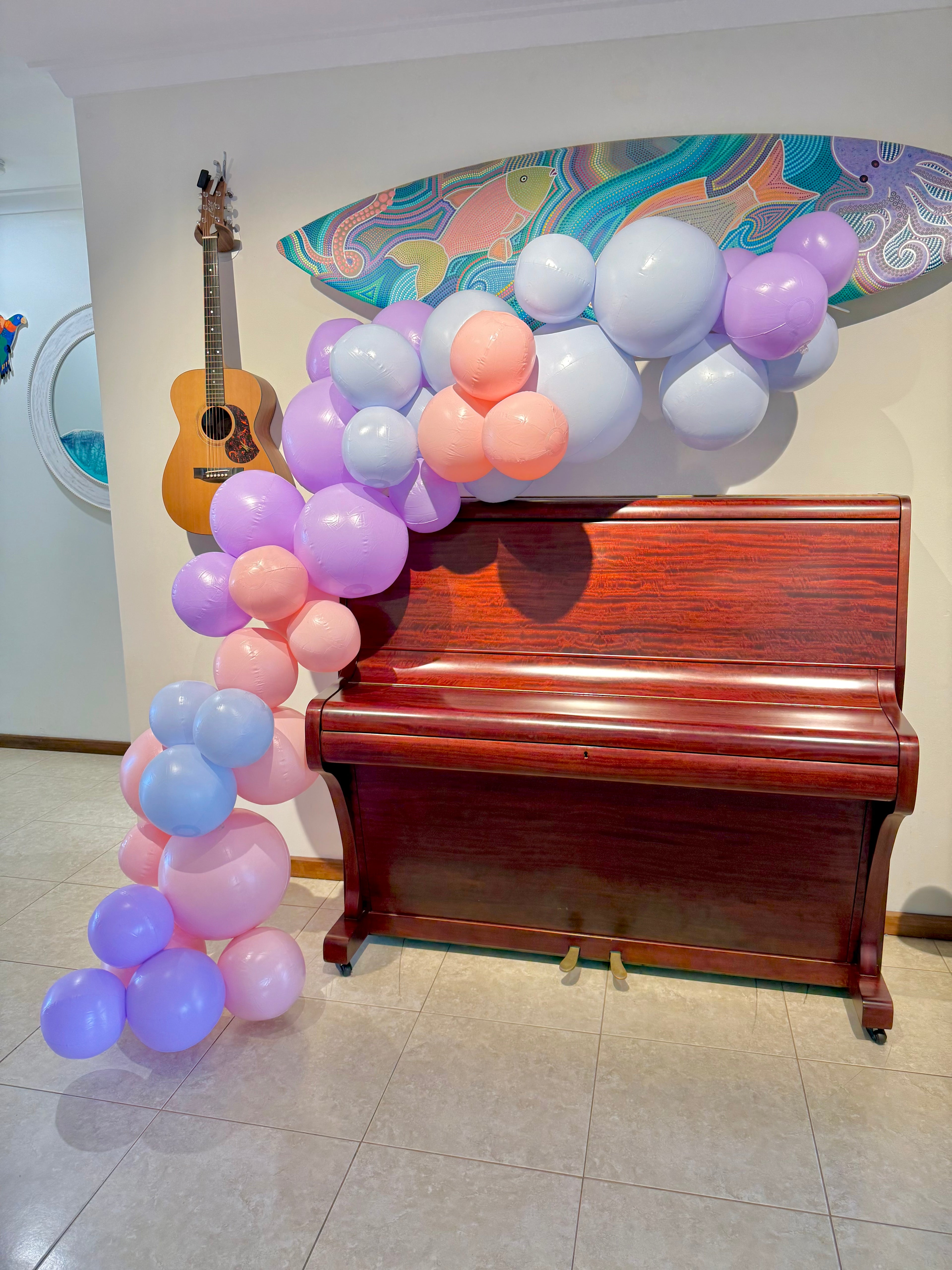 Sustainable party decoration using Evergarland reusable balloon garlands at a birthday celebration, reusable balloon alternative